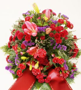 Trauergesteck in rot mit Lilien