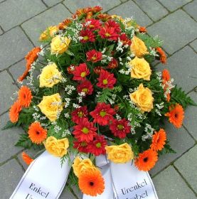 Trauergesteck in gelb/orange