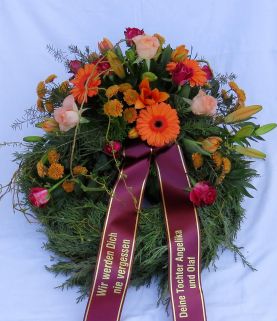 Trauerkranz für Urnengrab in orange